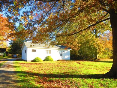 Second house, front side, facing west.
