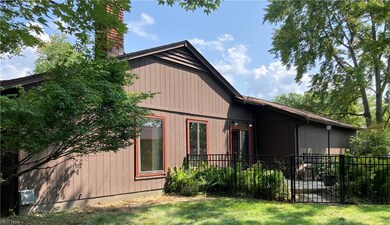 Side with patio off kitchen