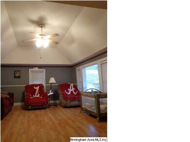 Living room showing vaulted ceiling