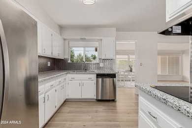 9909 W Sun City Blvd, Sun City, AZ 85351 - photo 2