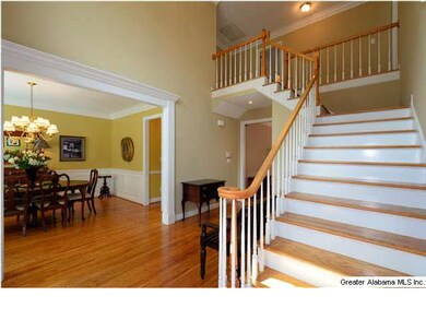 2 story Foyer, crown molding. Hardwood floors, ver