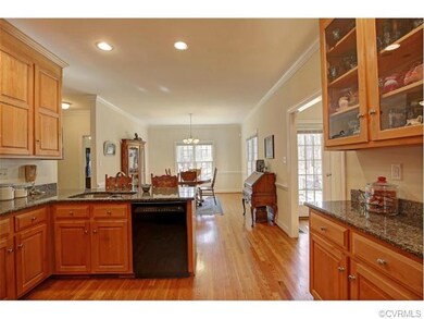 View of kitchen as it looks onto eat-in area.  Not