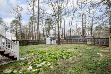Large rear fenced yard with detached tool shed