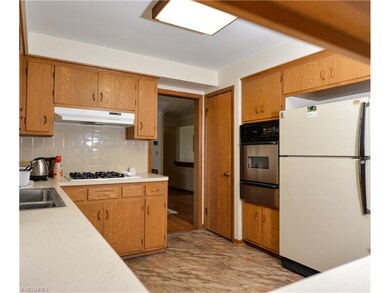 EAT-IN KITCHEN WITH NEWER BUILT-IN OVEN AND RANGE