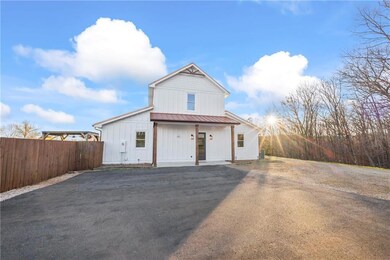 Front of home, beautiful barn-dominium style slab 