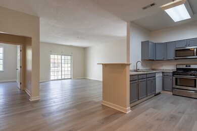 Spicket Commons unit 115, Methuen, MA 01844 - photo 4