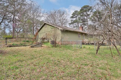 LEFT/BACK VIEW WITH FENCED GARDEN AREA