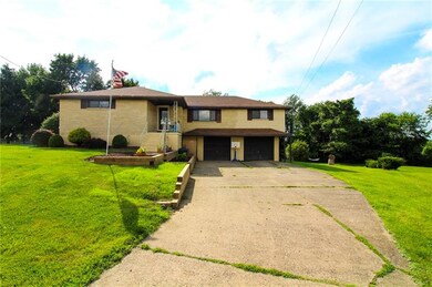 Spacious and long driveway for additional parking!
