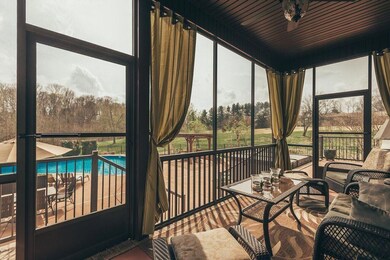 Right off the living room and eat-in kitchen is the screened in patio. Perfect for morning coffee.