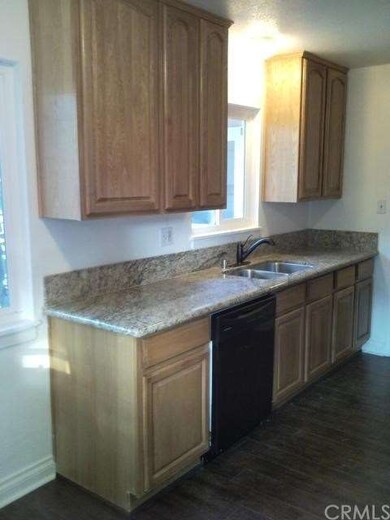 New Cabinets, Stainless Deep Sink, Dark Floors and
