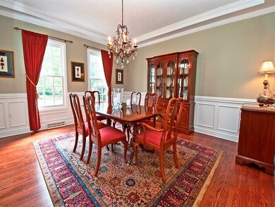 Exquisite dining room encircled in picture frame w