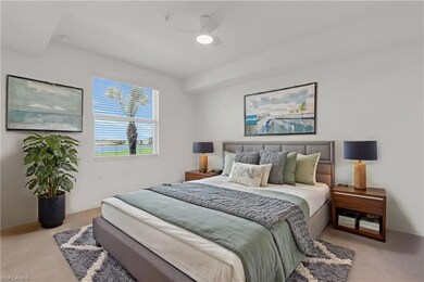 Bedroom featuring ceiling fan and light colored ca