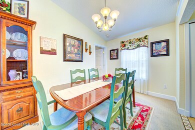 dining room with chandelier
