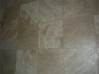 Newer vinyl in the kitchen and dining areas