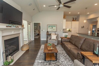 Living room featuring a fireplace with flush heart