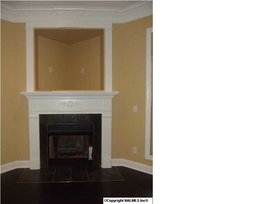 Natural gas fireplace, tv niche above mantle.