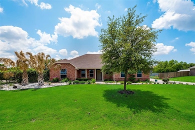 Beautiful landscaping and covered front porch