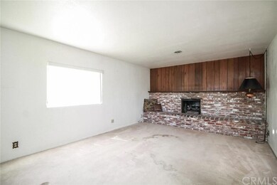 Beautiful fireplace with used brick front.