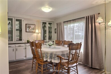 Great Formal Dining area with built-ins. So much storage and new laminate flooring.