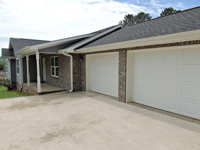 Brick, stacked stone & hardy board exter