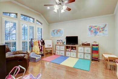 Large office or formal living sits just off the entry.