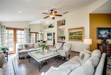 Wood French Doors Lead to the Covered Patio.