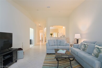 Great Room with Kitchen and Foyer at the end.