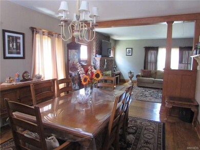 Large dining room off of kitchen and leading into 