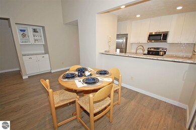 The dining area, wine bar, and newly remodeled kit