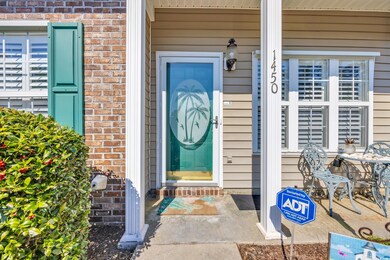 Doorway to property with brick siding