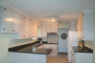 Kitchen open to dining