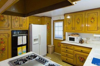 Beautiful hand painted cabinets by world renown ar