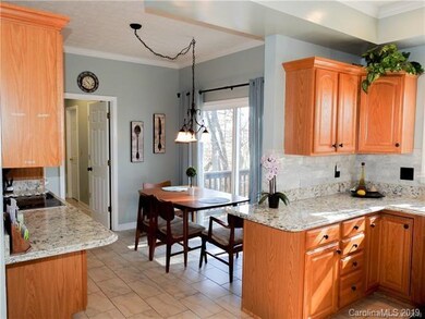 Breakfast Area with Doors Leading to Back Deck