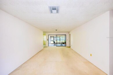 Spacious living room with natural light & view to backyard~