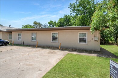 View of side of home featuring stucco siding and a