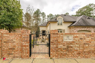 View of gate with a fenced front yard