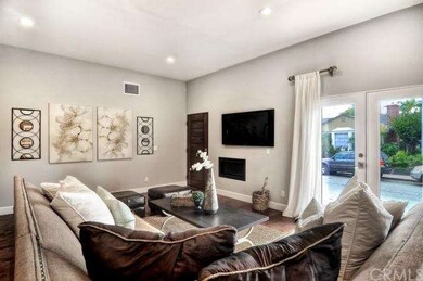 Open and spacious, the living room features a cont