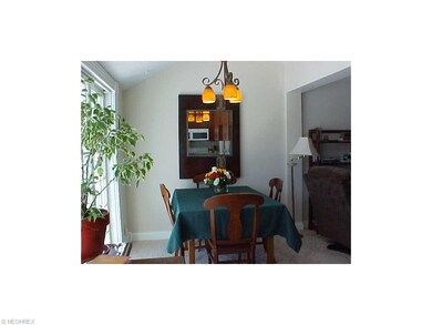 DINING ROOM WITH FULL VIEW OF THE LAKE AND LOVELY 