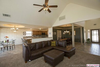 This home has an open floor plan with tall ceiling