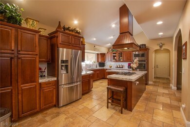 kitchen features all stainless steel appliances --