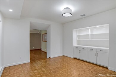 Formal dining room with lighted  built-in buffet a