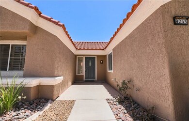 Front entry - stucco eaves and new exterior paint