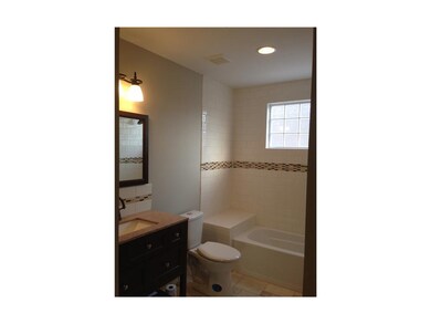 Beautifully remodeled bathroom with designer tile 