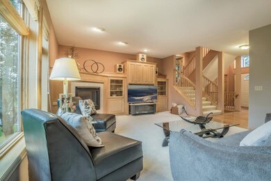 Living room highlights tile surround gas fireplace