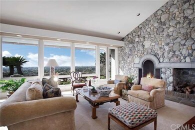 Views from living room with stone fireplace