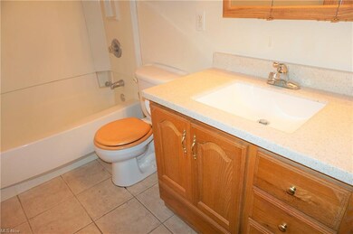 Bathroom has tub shower combo