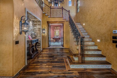 Foyer w/ grand staircase