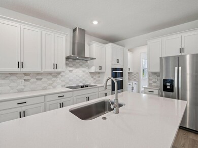 Photo is not of the actual home, but is an inspirational photo of builder’s model home and may depict options, furnishings, and/or decorator features that are not included