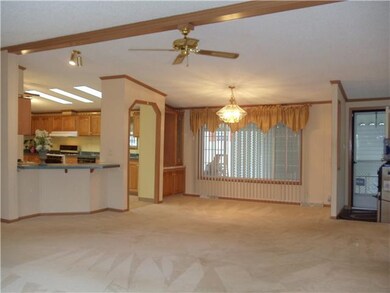 View. Main Entrance door with Dining room area and