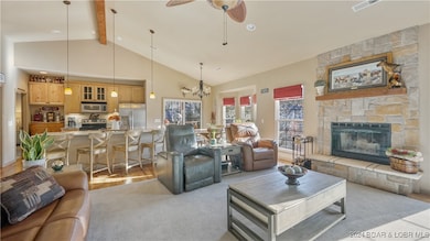 Main level family room with wood fireplace